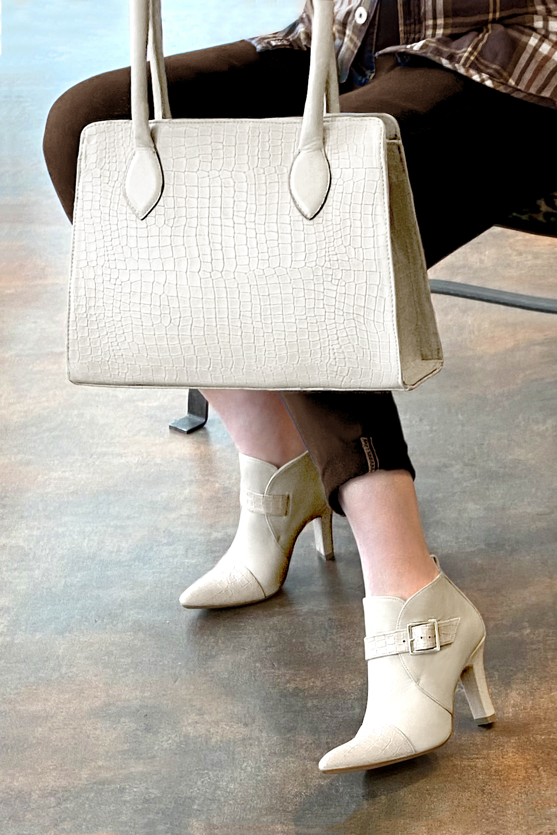 Off white women's ankle boots with buckles at the front. Tapered toe. Very high kitten heels. Worn view - Florence KOOIJMAN